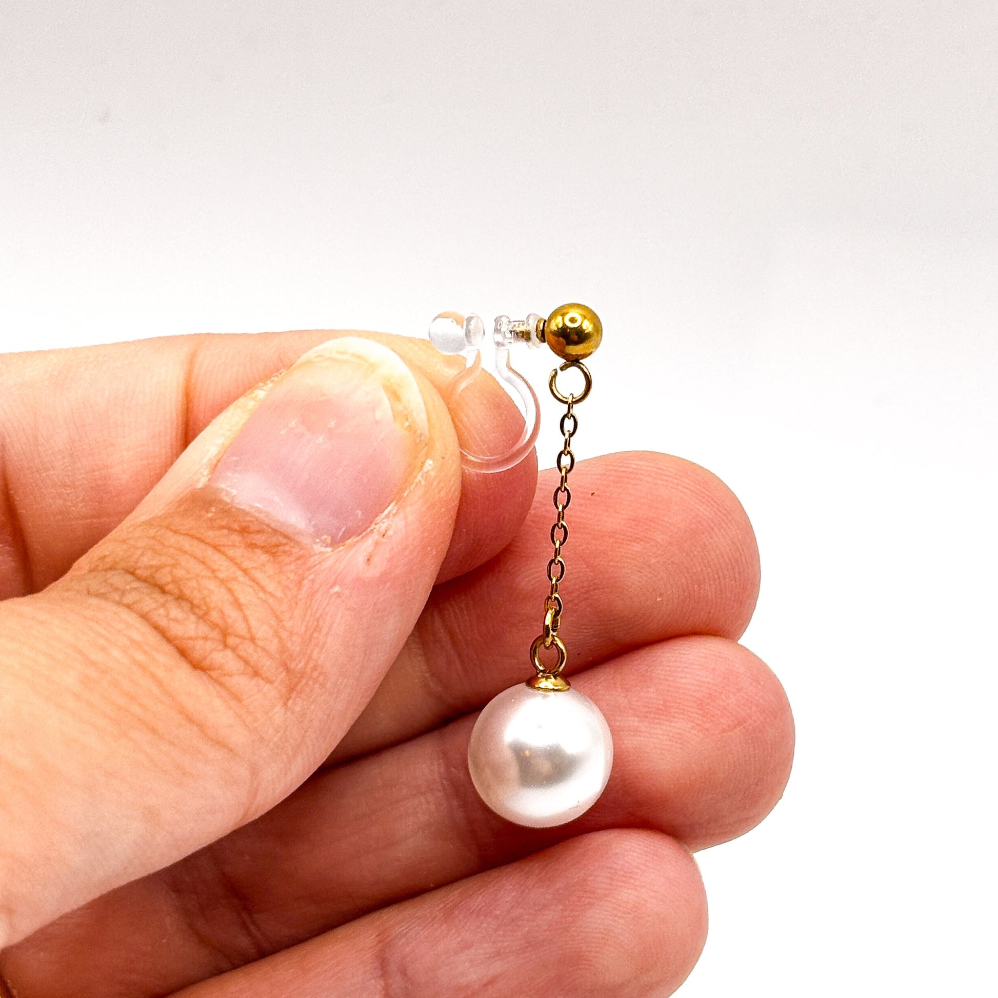 Pearl Dangle – Hängende Perlen Ohrclips ohne Ohrlöcher