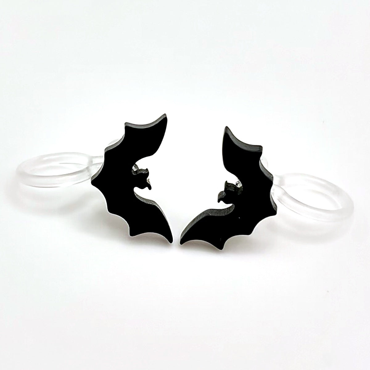 Schwarze Fledermaus Ohrclips mit transparentem Clip